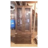 Gun cabinet, does have four drawers on the bottom