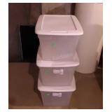Group of three clear storage totes