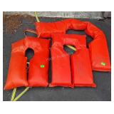 Group of three life vests