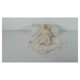 Porcelain doll with blanket and box, 9"