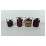 Four crocks, includes three cheese crocks and one