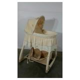 Bassinet with under storage and musi. Cover needs
