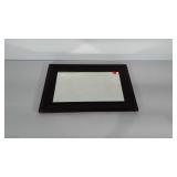 Early framed mirror. Measures 25.5x17.5 inches.