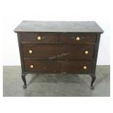 Older dresser with two drawers over two drawers.