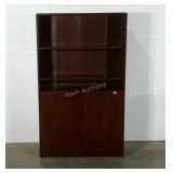 Office cabinet. Shelves over blind storage.