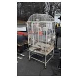 Metal bird cage on wheels