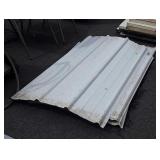 Sections of metal wall panels