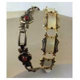 Two bracelets, mother of pearl (has one link