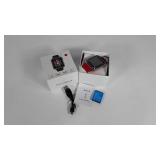 Smart Watch in box with power cord and battery