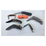 Pocket knives and a blade sharpener