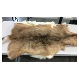 Two deer hide  rugs approx 4ft long