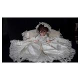 Doll with pillow, vinyl