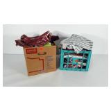Box and crate of fabric scraps.
