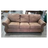 Three cushion microfiber sofa with rolled arms