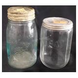 Two glass jars, one marked tea, one marked