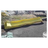 Yellow sliding board