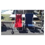 2 folding beach chairs