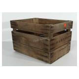 Wooden fruit crate with the letters "HARVIE" on