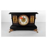 Mantle column clock with lions heads, Wm. L