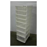 Plastic storage drawers on wheels.  Eight