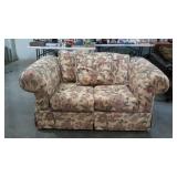 Barkel loveseat in floral upholstery with rolled
