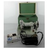 Singer sewing machine with attachments, foot