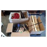 Skid lot: golf club, shoes, gift wrap, wall art,