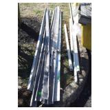 Aluminum drip edge and pieces of PVC pipe