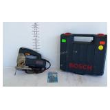 Bosch jigsaw with blades and case, tested and