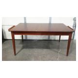 Ethan Allen dining table with two drawers.