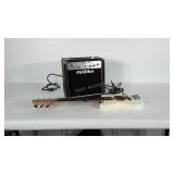 First Act Amp and child sized electric guitar.