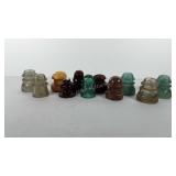 Glass and porcelain insulators, includes eleven,