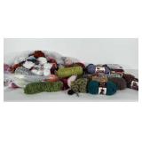 Large bag of yarn. Varying textures and colors.