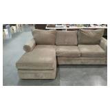 Two piece sectional sofa with chaise end. Needs