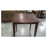 High top pub table, no stools. Shows wear.