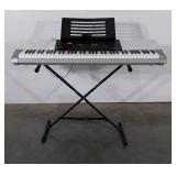 Casio keyboard with stand, model WK-220, tested