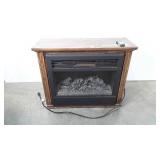 Heat Surge Fireplace space heater with remote, on