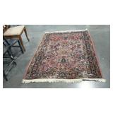 Older wool area rug. Shows wear, see pics.