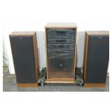 Sony stereo system in cabinet, two speakers,