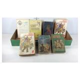 Eight Boy Scout handbooks