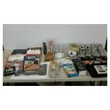 Group lot: books, candles, glasses, shoes, phone