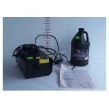 Fogger Machine with partial jug of fog liquid.