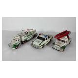 Three Hess car and trucks, no boxes