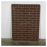 Wood stove pad for wall or floor. Brick pattern.