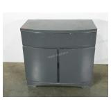 Oainted two door cabinet with one drawer. Curved