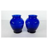 Two cobalt blue glass vases, stand 7" tall