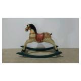 Doll size rocking horse. 29" long, 22" high.