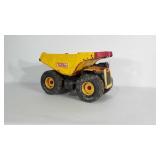 Metal Tonka dump truck. Measures 18" long and 11"
