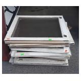 15 wood framed window screens, 27x29"