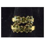 Two peridot costume rings size 6 and 8